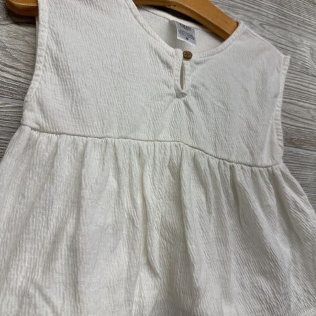 Sleeveless Textured Peplum Shirt 12M
