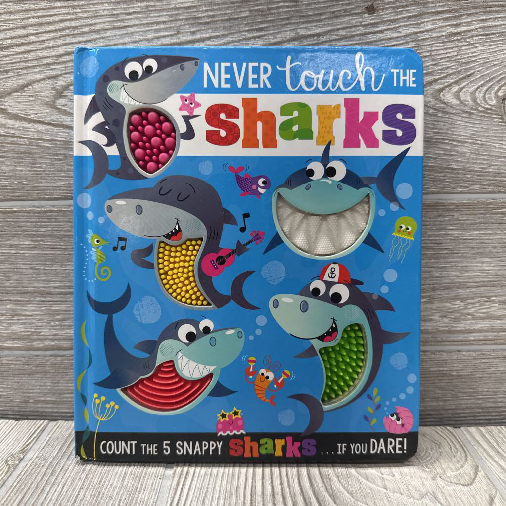 Never Touch The Sharks Board Book