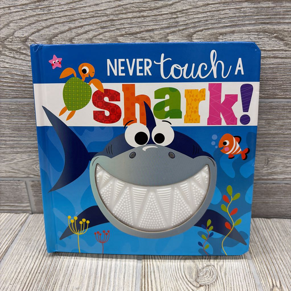 Never Touch A Shark Hardcover