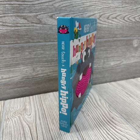 Never Touch A Hungry Hippo Board Book