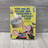 There Was An Old Lady Who Swallowed A Birthday Cake! Hardcover Book