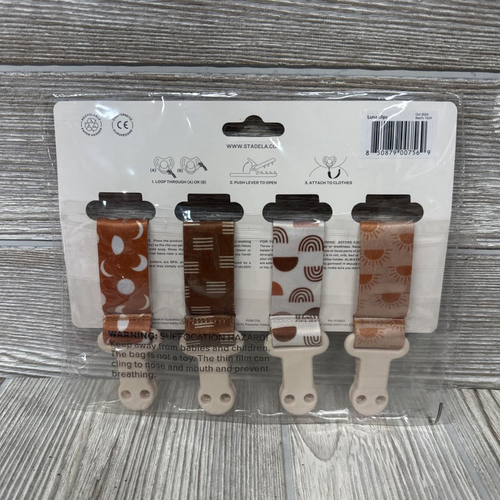 NEW 4 Pk Pacifier Clips Suns & Lines